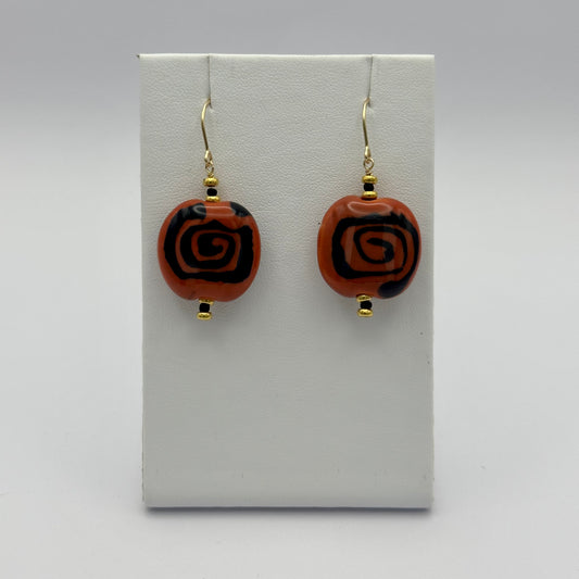 Kenyan Clay Bead Earrings: burnt orange and black spirals